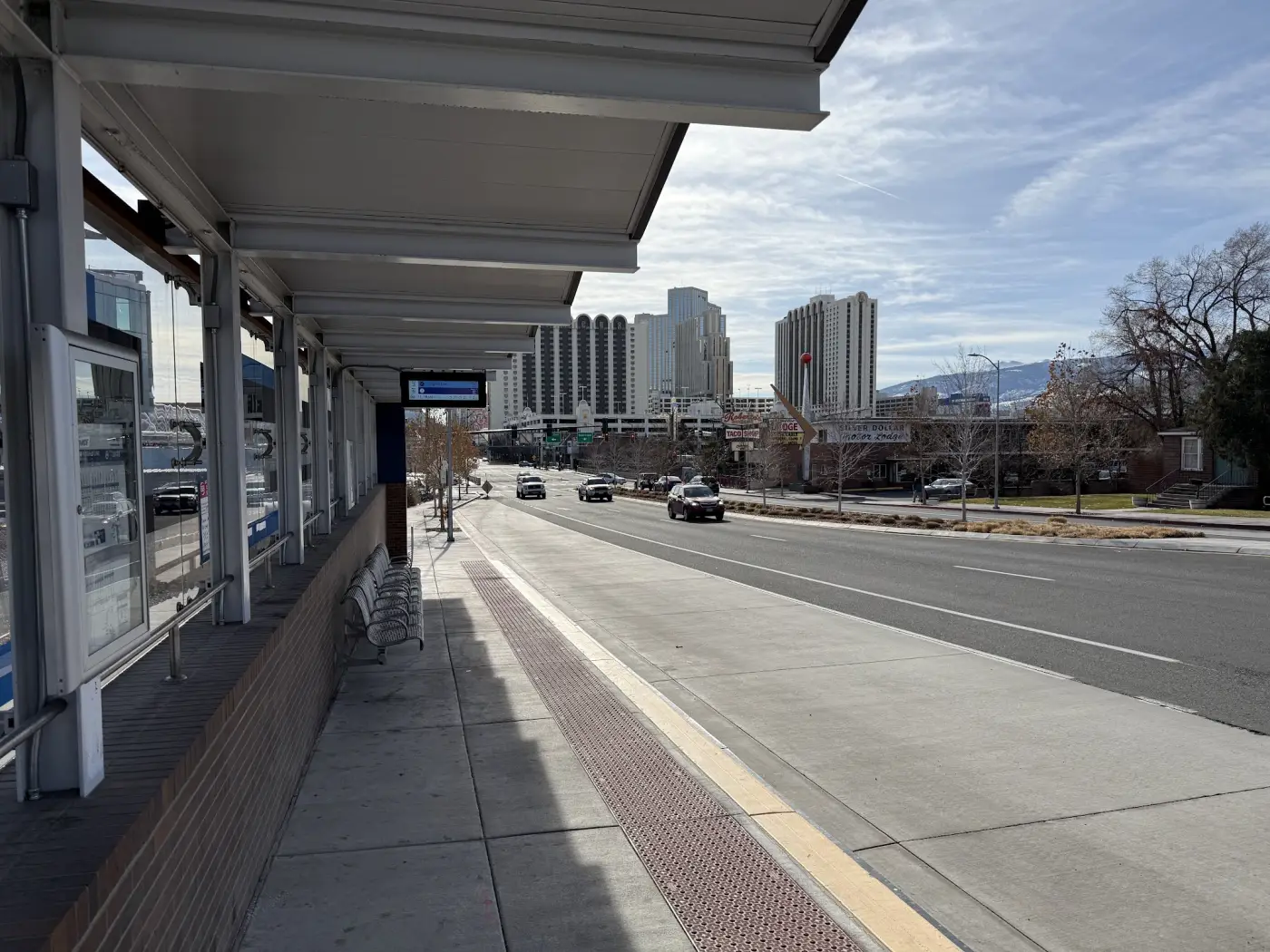 BRT station platform with wayside information displays along the canopy